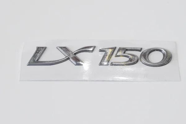 656224 - SCRITTA LATERALE "LX150" ORIGINALE PER VESPA LX 150 2005>2009 Nuova Collezione